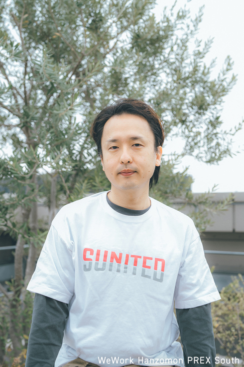 都久井　哲也