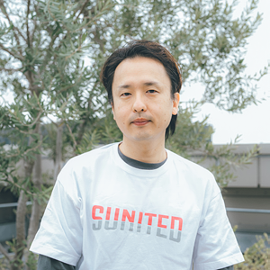 都久井　哲也
